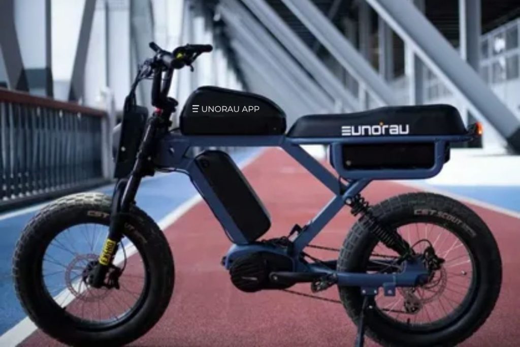 Side view of a EUNORAU electric bike on a track with visible branding, showcasing the EUNORAU App.